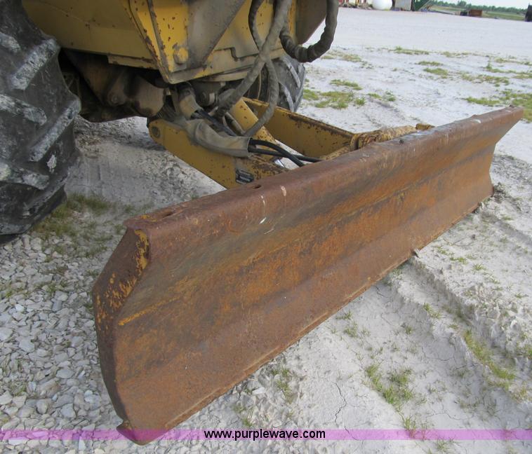image for item B2702 1999 Vermeer V4750 trencher/backhoe combo with cable plow