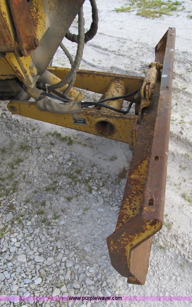 image for item B2702 1999 Vermeer V4750 trencher/backhoe combo with cable plow
