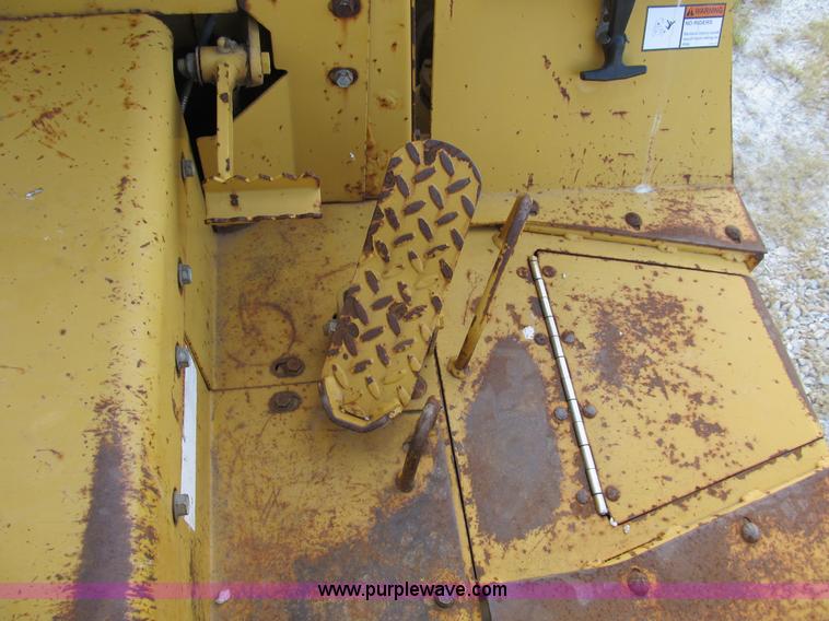 image for item B2702 1999 Vermeer V4750 trencher/backhoe combo with cable plow