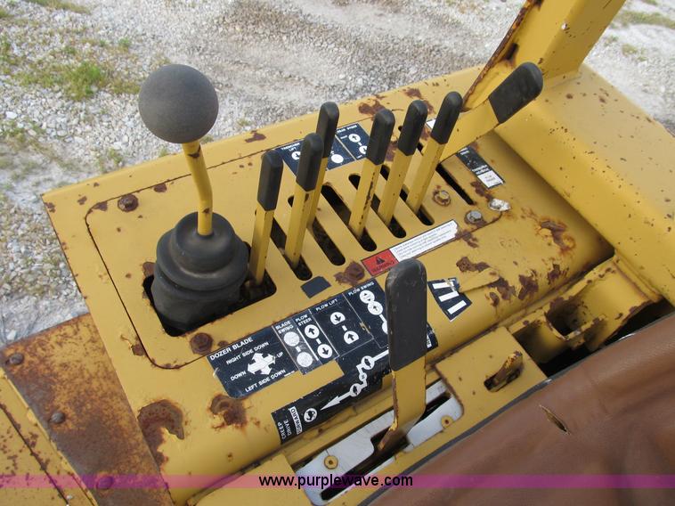 image for item B2702 1999 Vermeer V4750 trencher/backhoe combo with cable plow