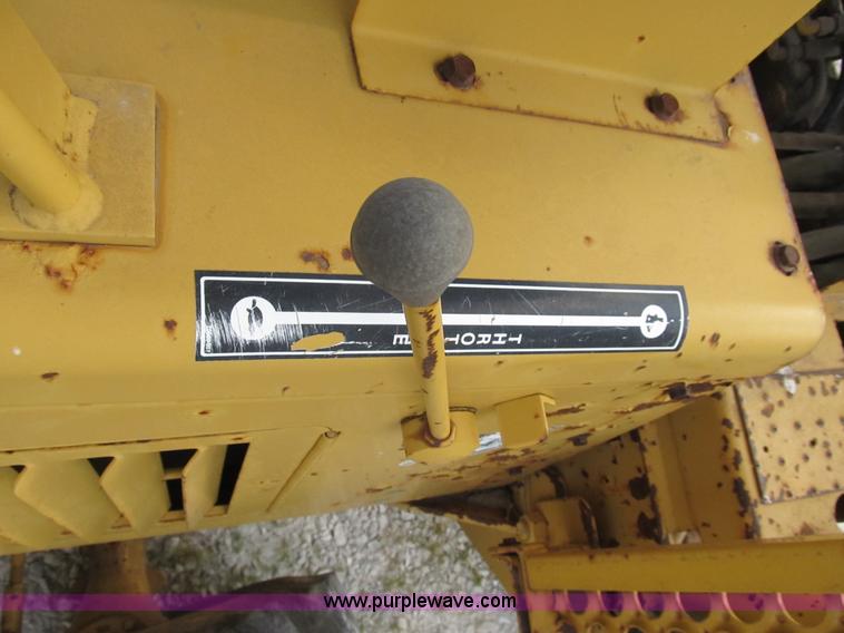 image for item B2702 1999 Vermeer V4750 trencher/backhoe combo with cable plow