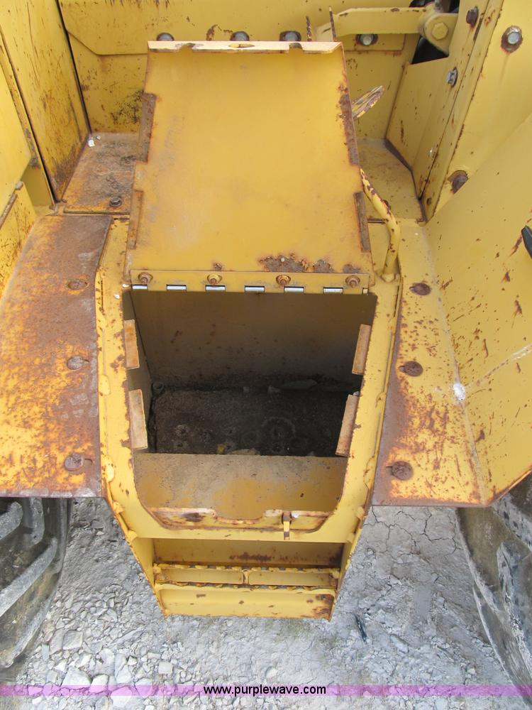 image for item B2702 1999 Vermeer V4750 trencher/backhoe combo with cable plow