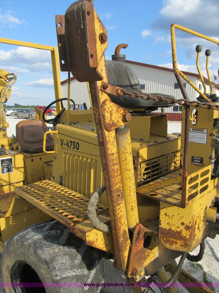 image for item B2702 1999 Vermeer V4750 trencher/backhoe combo with cable plow