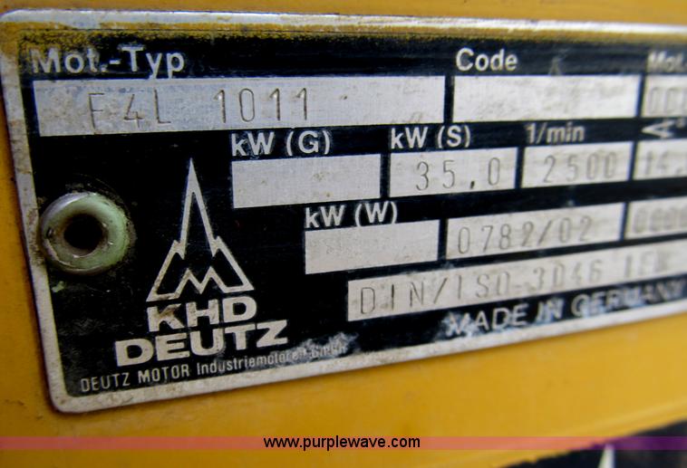 image for item B2702 1999 Vermeer V4750 trencher/backhoe combo with cable plow