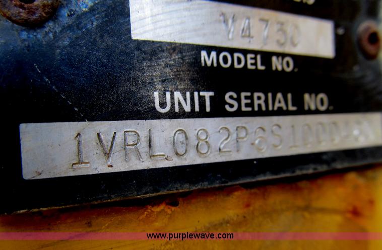 image for item B2702 1999 Vermeer V4750 trencher/backhoe combo with cable plow