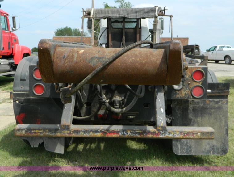 image for item B3678 1994 Mack RD690S roll off truck