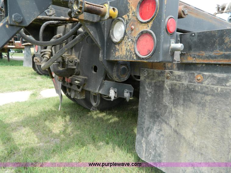 image for item B3678 1994 Mack RD690S roll off truck