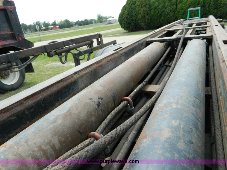 image for item B3678 1994 Mack RD690S roll off truck