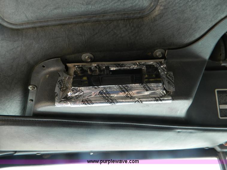 image for item B3678 1994 Mack RD690S roll off truck