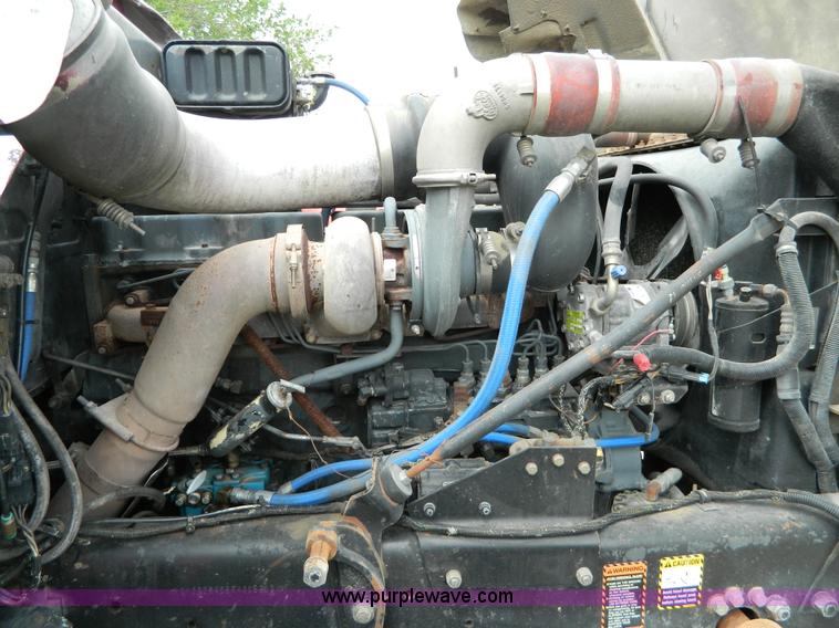 image for item B3678 1994 Mack RD690S roll off truck