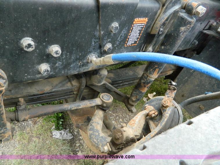 image for item B3678 1994 Mack RD690S roll off truck