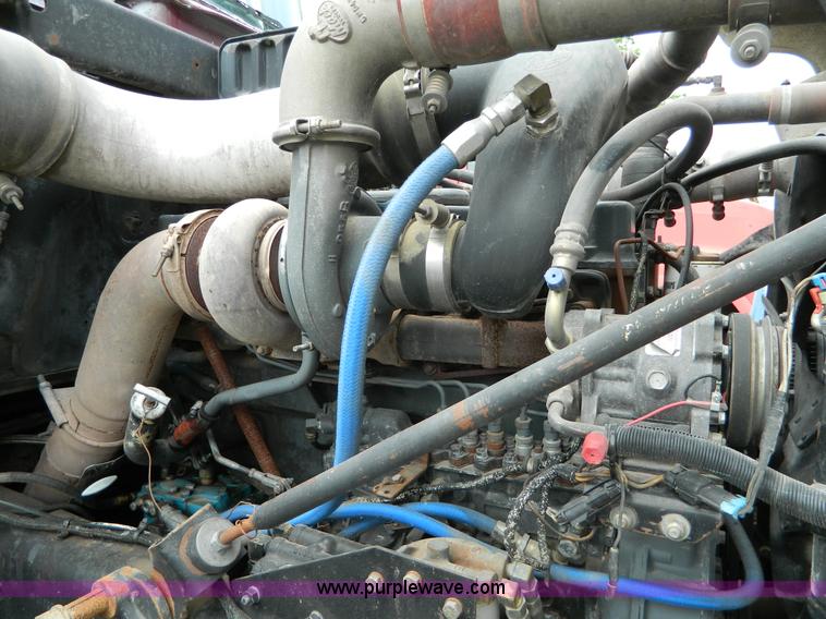 image for item B3678 1994 Mack RD690S roll off truck