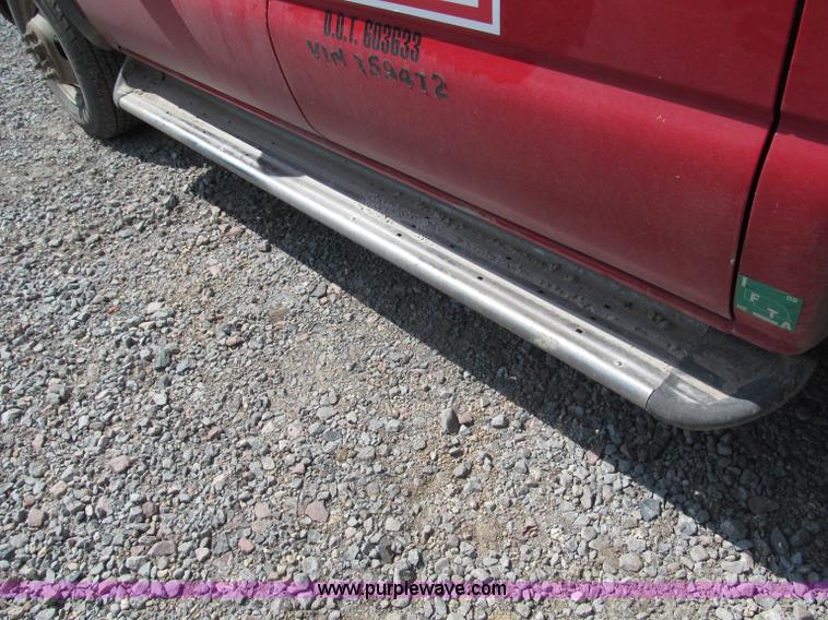 image for item B5145 2004 GMC 3500 SLE crew cab flatbed pickup truck