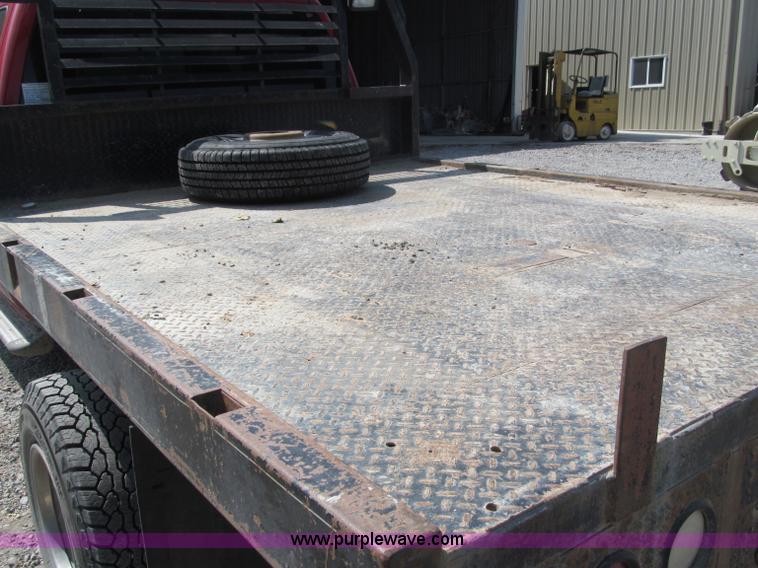 image for item B5145 2004 GMC 3500 SLE crew cab flatbed pickup truck