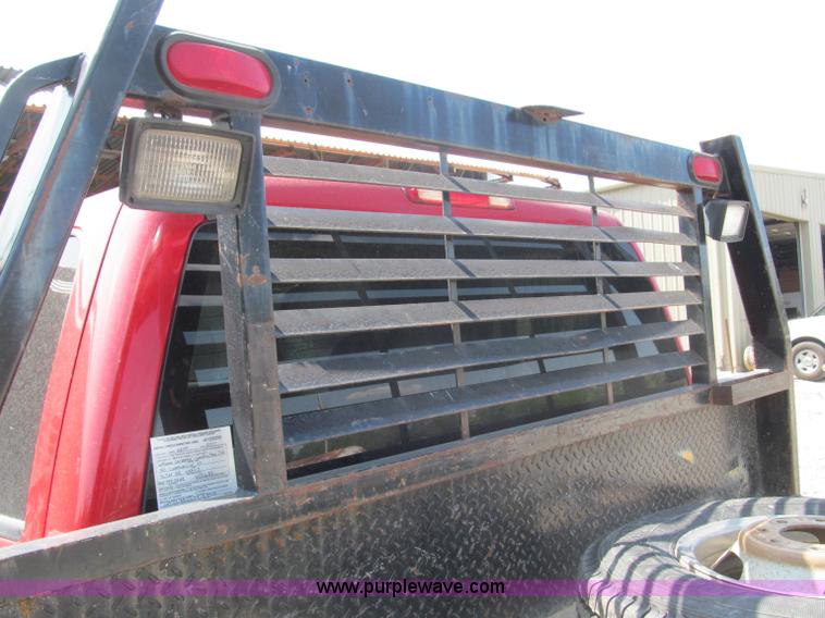 image for item B5145 2004 GMC 3500 SLE crew cab flatbed pickup truck