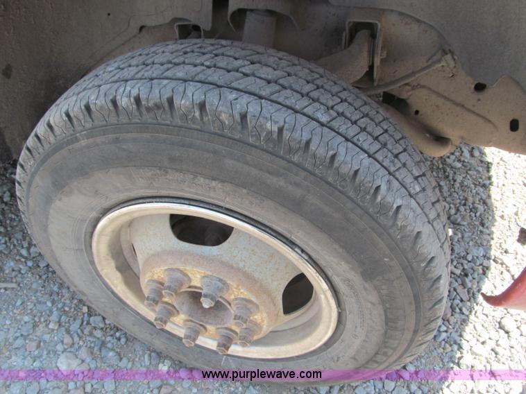 image for item B5145 2004 GMC 3500 SLE crew cab flatbed pickup truck