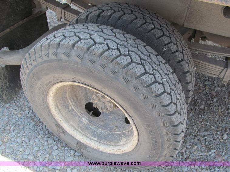 image for item B5145 2004 GMC 3500 SLE crew cab flatbed pickup truck