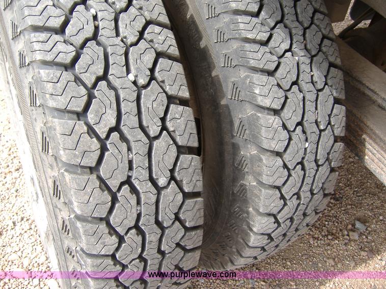 image for item B5145 2004 GMC 3500 SLE crew cab flatbed pickup truck