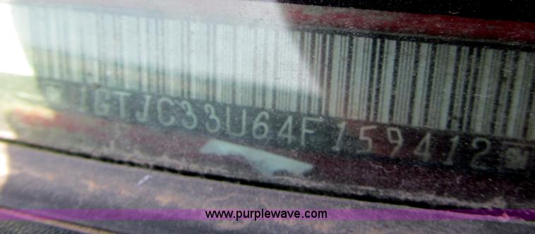 image for item B5145 2004 GMC 3500 SLE crew cab flatbed pickup truck