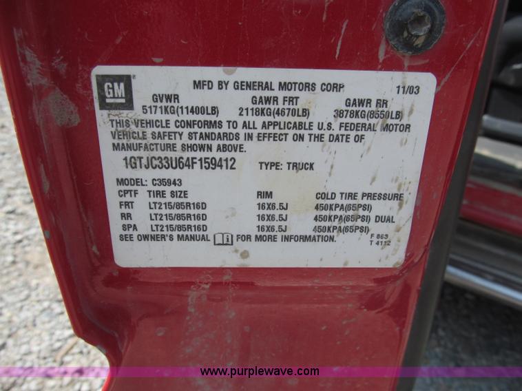 image for item B5145 2004 GMC 3500 SLE crew cab flatbed pickup truck