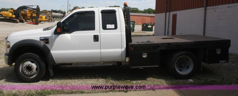 image for item B6537 2008 Ford F450 XLT flatbed pickup truck