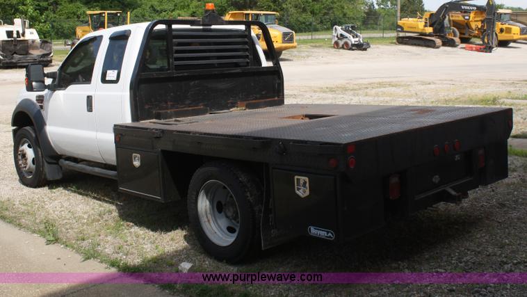 image for item B6537 2008 Ford F450 XLT flatbed pickup truck