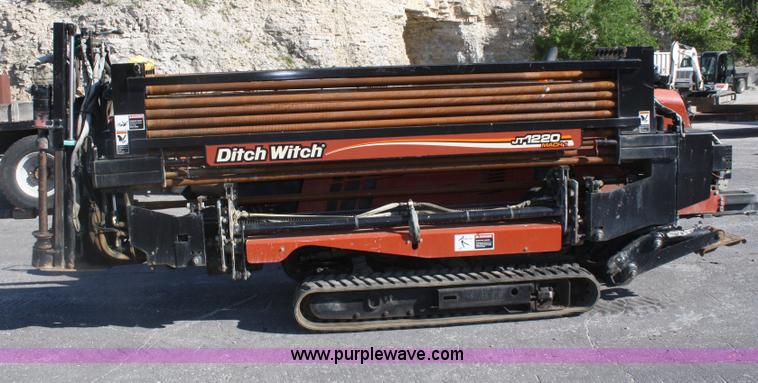 image for item B6606 2005 Ditch Witch 1220 Mach I directional drill with mud mixer and trailer