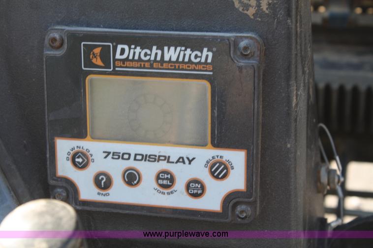 image for item B6606 2005 Ditch Witch 1220 Mach I directional drill with mud mixer and trailer