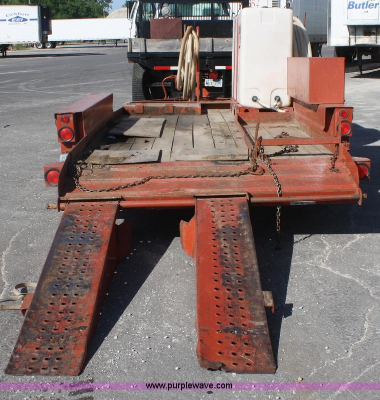 image for item B6606 2005 Ditch Witch 1220 Mach I directional drill with mud mixer and trailer