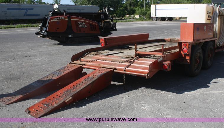 image for item B6606 2005 Ditch Witch 1220 Mach I directional drill with mud mixer and trailer