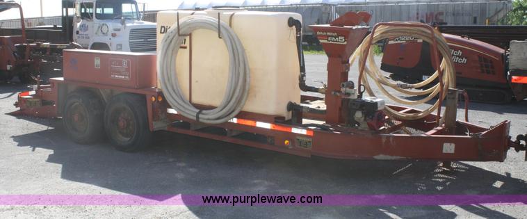 image for item B6606 2005 Ditch Witch 1220 Mach I directional drill with mud mixer and trailer