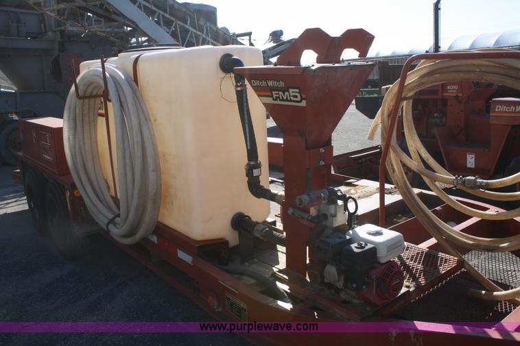 image for item B6606 2005 Ditch Witch 1220 Mach I directional drill with mud mixer and trailer