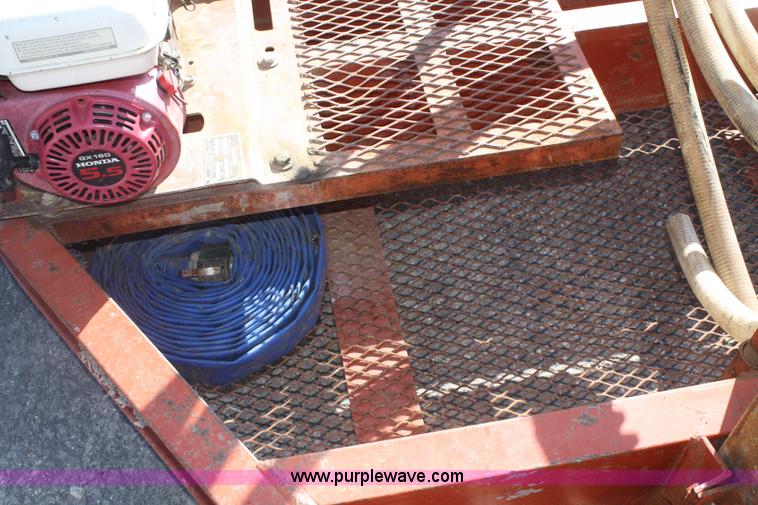 image for item B6606 2005 Ditch Witch 1220 Mach I directional drill with mud mixer and trailer