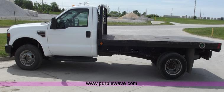 image for item C2075 2009 Ford F350 XL Super Duty flatbed pickup truck