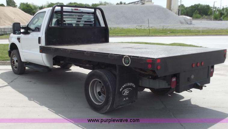 image for item C2075 2009 Ford F350 XL Super Duty flatbed pickup truck