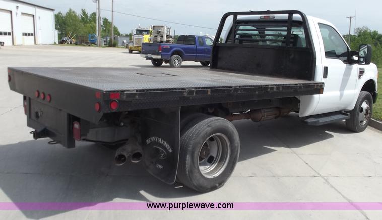 image for item C2075 2009 Ford F350 XL Super Duty flatbed pickup truck