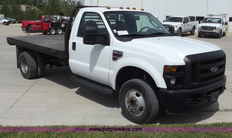 image for item C2075 2009 Ford F350 XL Super Duty flatbed pickup truck