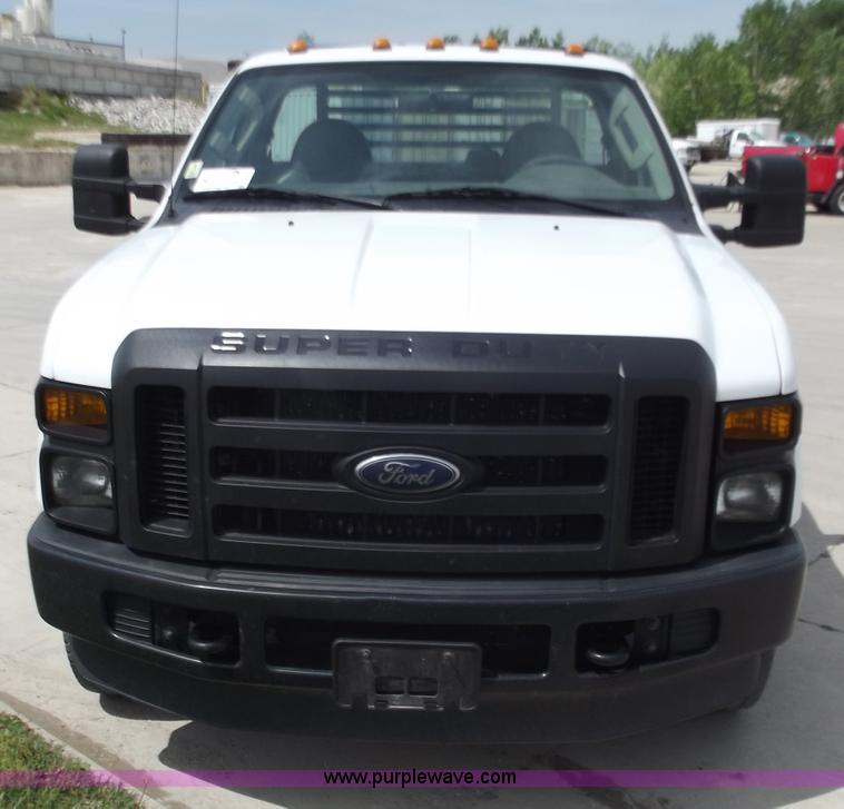 image for item C2075 2009 Ford F350 XL Super Duty flatbed pickup truck