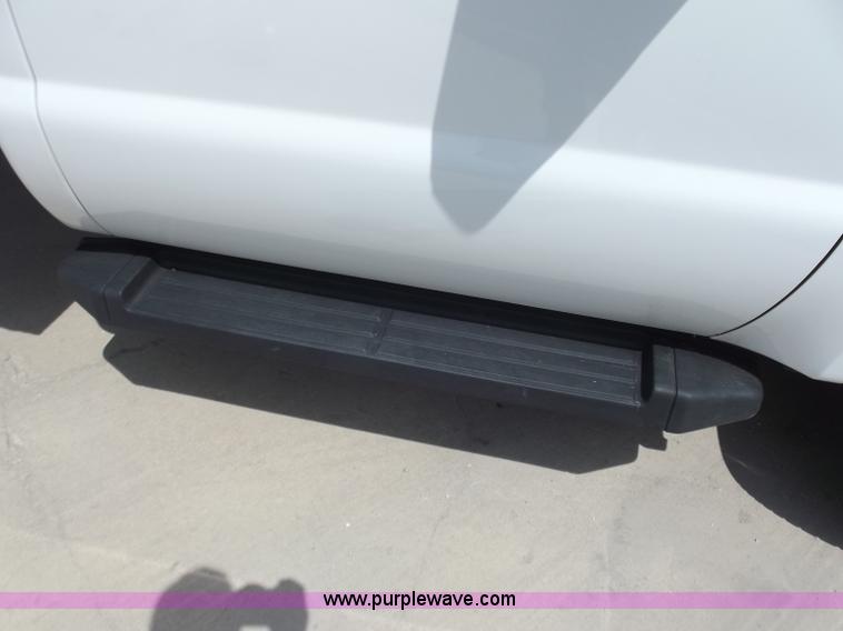 image for item C2075 2009 Ford F350 XL Super Duty flatbed pickup truck