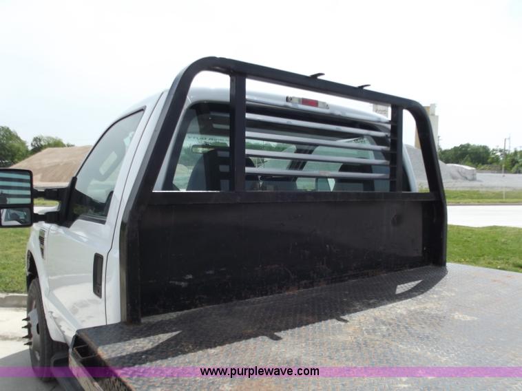 image for item C2075 2009 Ford F350 XL Super Duty flatbed pickup truck