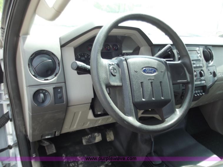 image for item C2075 2009 Ford F350 XL Super Duty flatbed pickup truck