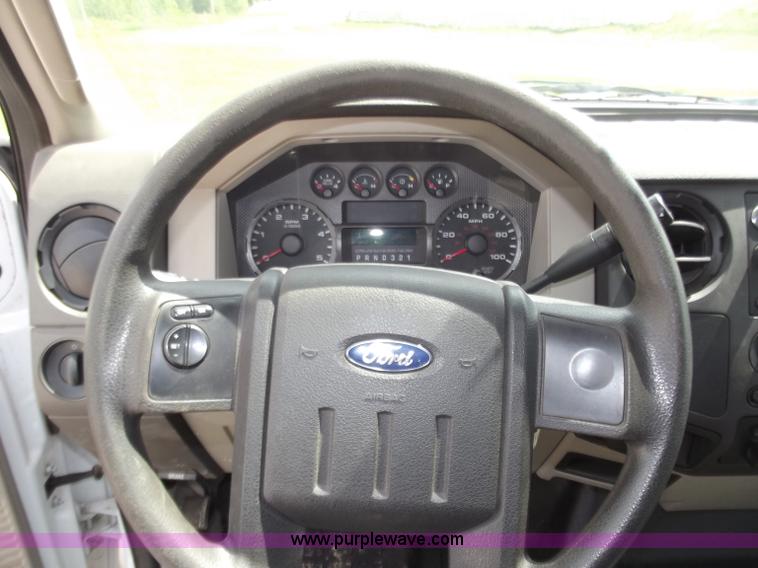 image for item C2075 2009 Ford F350 XL Super Duty flatbed pickup truck