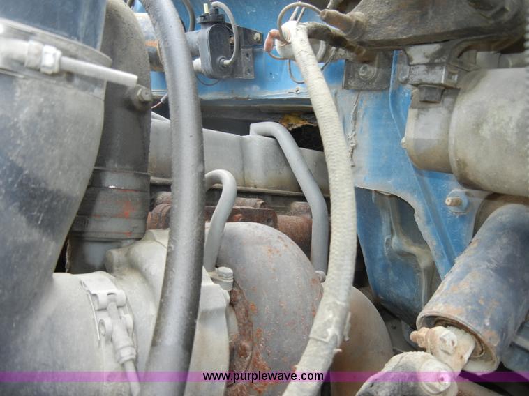 image for item D4057 1987 Ford F700 flatbed truck