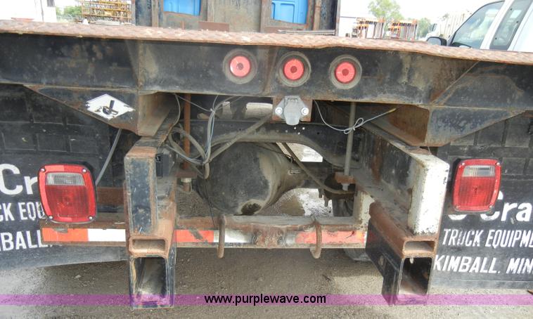 image for item D4057 1987 Ford F700 flatbed truck