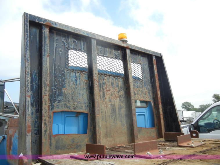 image for item D4057 1987 Ford F700 flatbed truck