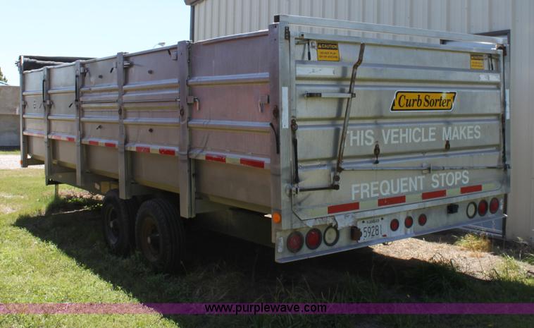image for item D7911 2000 Kahn Versahall 20' tandem axle dump trailer