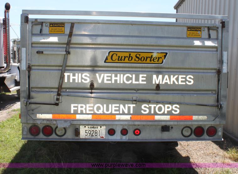 image for item D7911 2000 Kahn Versahall 20' tandem axle dump trailer