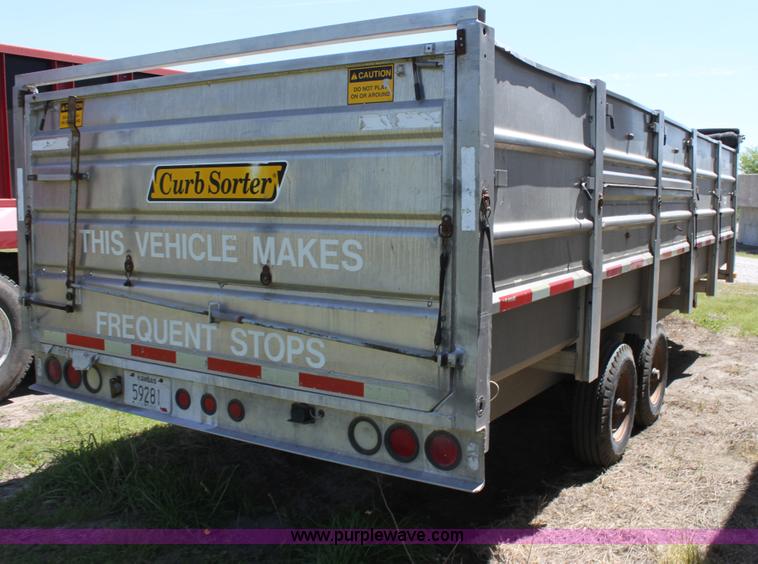 image for item D7911 2000 Kahn Versahall 20' tandem axle dump trailer