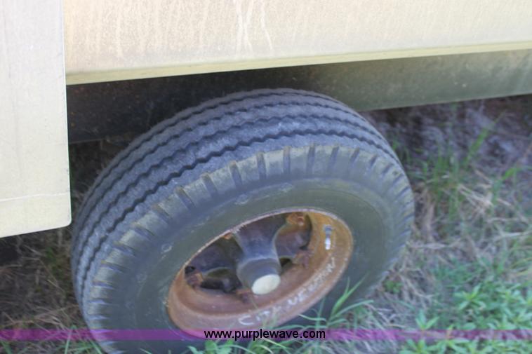 image for item D7911 2000 Kahn Versahall 20' tandem axle dump trailer