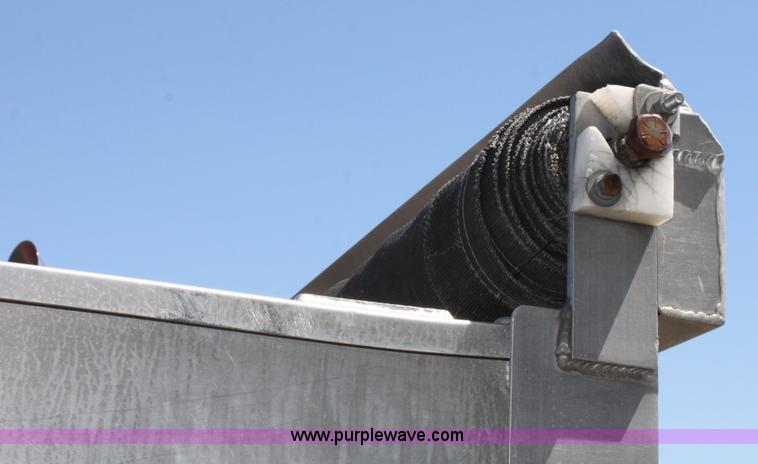 image for item D7911 2000 Kahn Versahall 20' tandem axle dump trailer